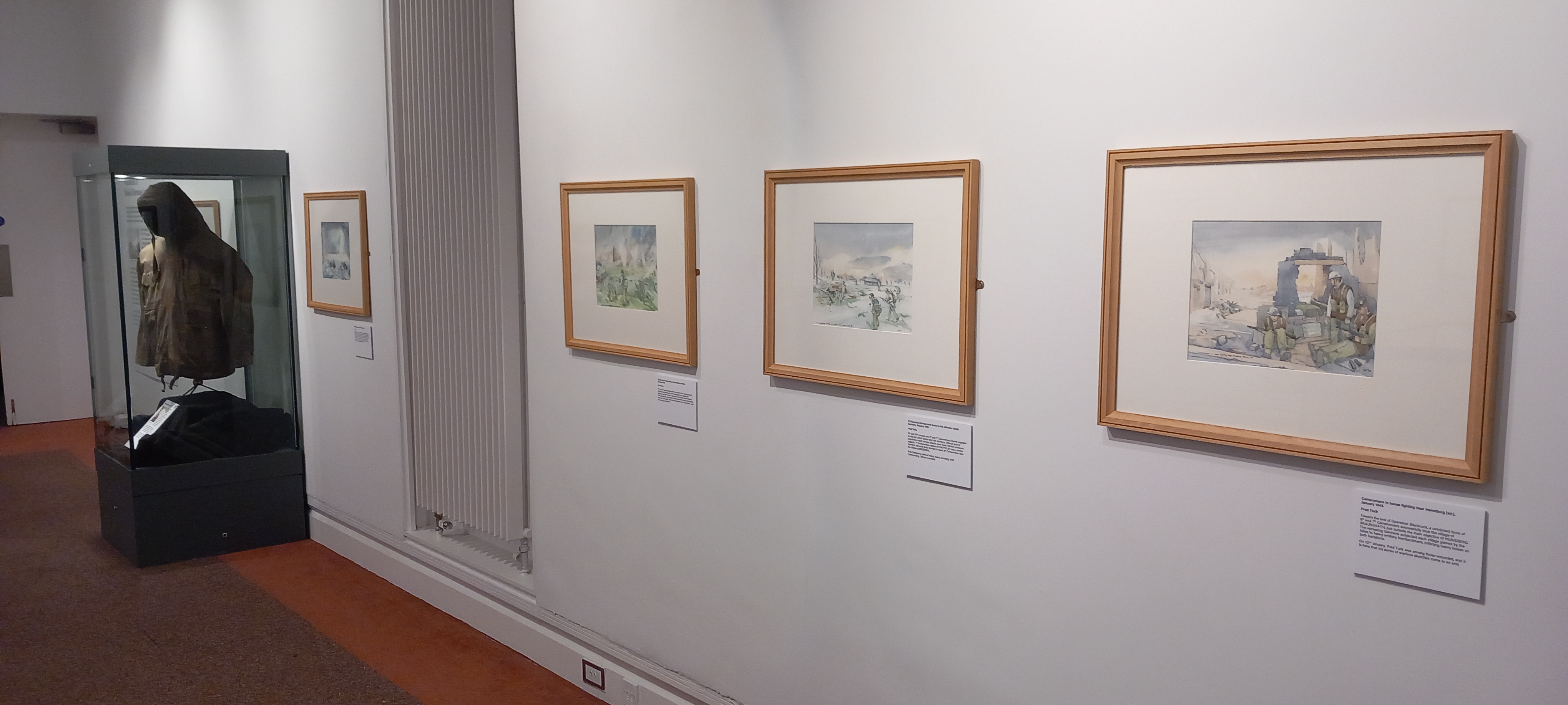 Image of display of paintings in Low Parks Museum Dutch Don't Forget exhibition
